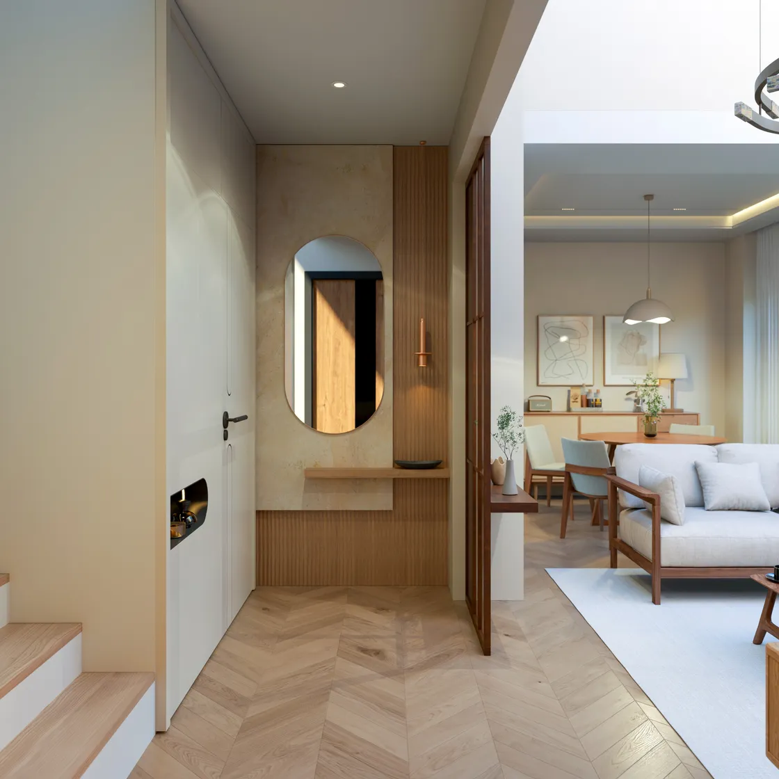 Villa girişi: oval aynalı ve ahşap lamel kaplı antre nişi, altında konsol raf; sağda salona ve yemek alanına açılan geçiş, solda merdiven basamakları